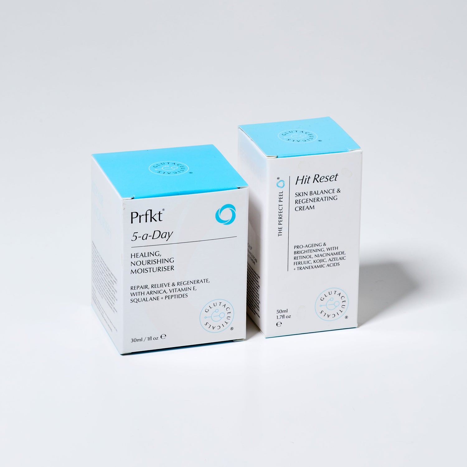 Two skincare product boxes labeled '5-a-Day' and 'Hit Reset' on a light gray background